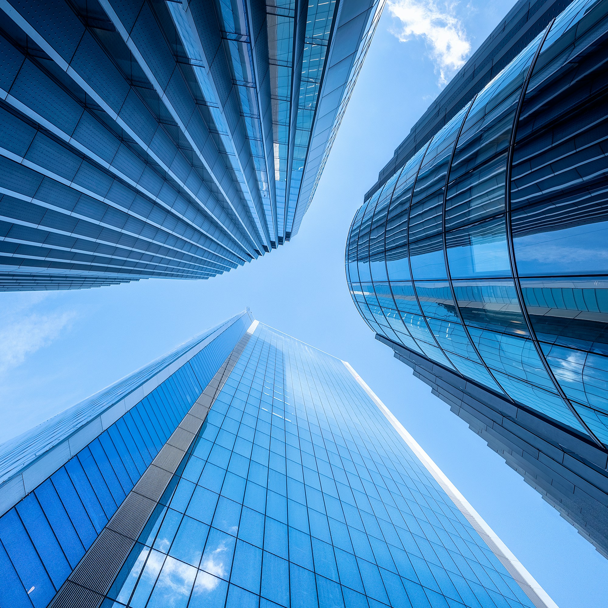 Modern glass architecture viewed from below