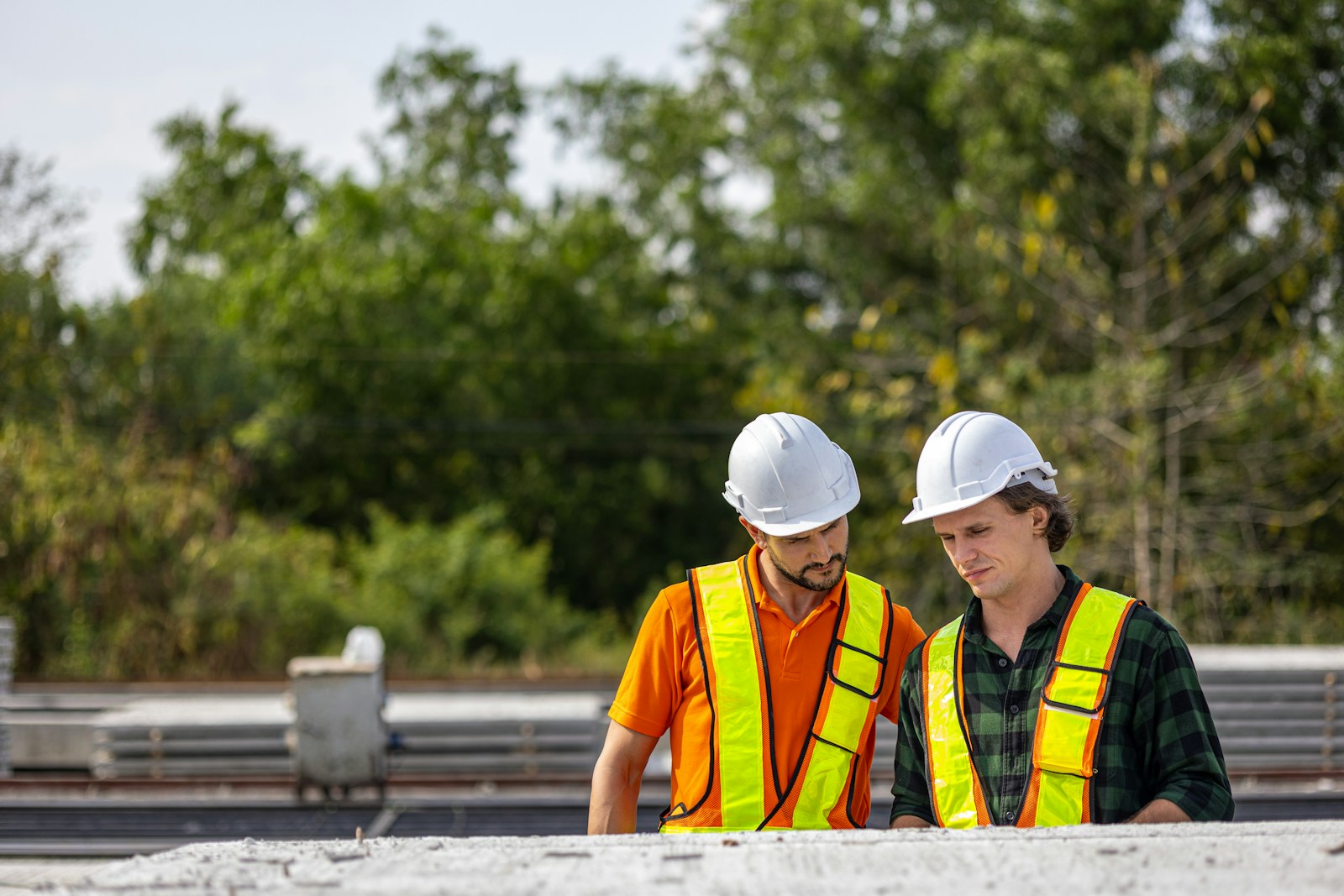 Construction professionals reviewing plans