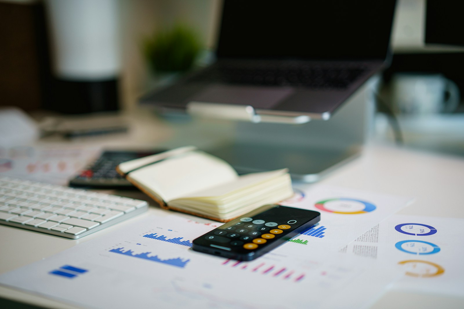 Financial planning documents and calculator on a desk